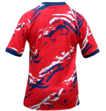 Red and blue ICHNOS Kids Football Kit Shirt, vibrant design, perfect for young players on the pitch. Rear view